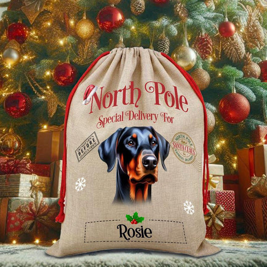Personalised Dog Doberman – North Pole Special Delivery Santa Sack Pet Gift, by Floppsie Moppsie – floppsiemoppsie at floppsiemoppsie.co.uk