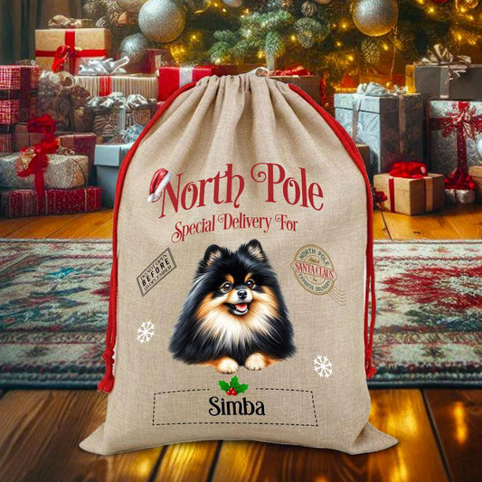 Personalised Dog Black and Tan Pomeranian – North Pole Special Delivery Santa Sack Pet Gift, by Floppsie Moppsie – floppsiemoppsie at floppsiemoppsie.co.uk